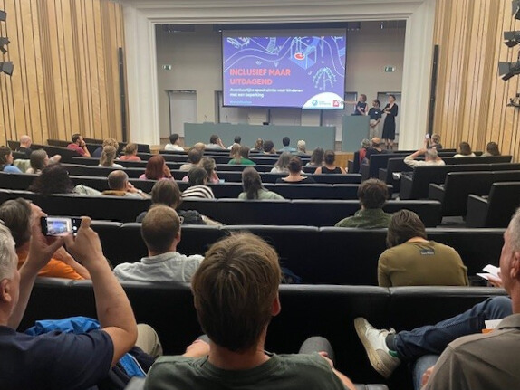 Publiek in auditorium